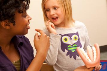 Speech therapist with a child