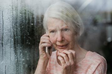 Worried woman on the phone